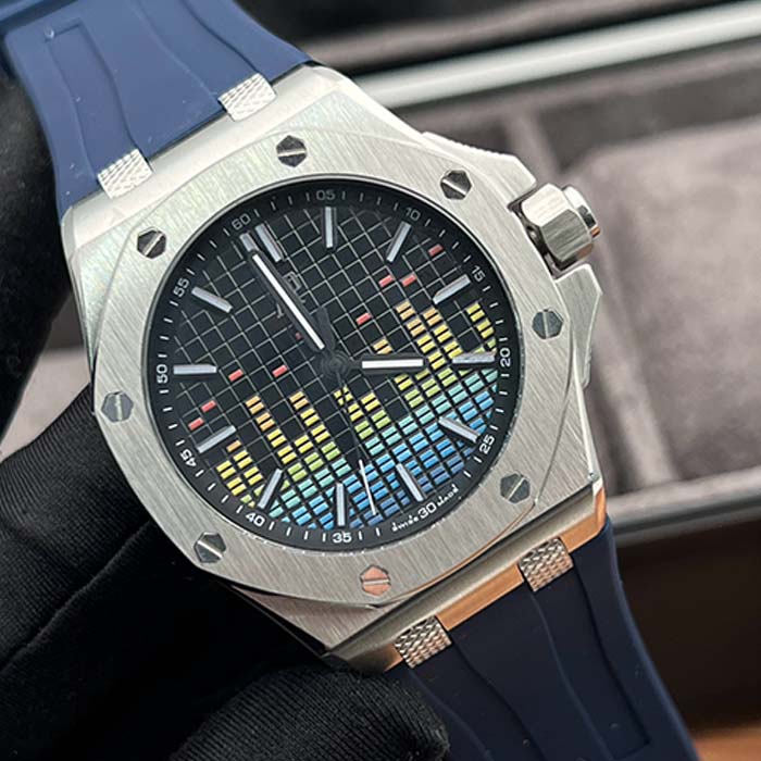 Reloj Audemars Piguet Royal Oak con correa azul marino y esfera negra estilo ecualizador con detalles de colores.