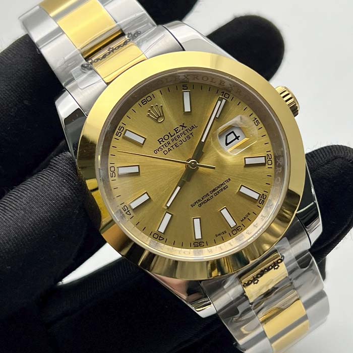 Reloj tipo Rolex Datejust con esfera dorada, bisel pulido y correa bicolor, ideal para hombres elegantes y seguros en Colombia.
