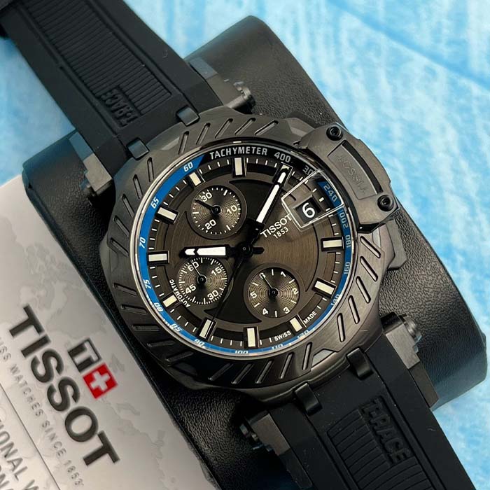 Reloj Tissot T-Race deportivo para hombre en color negro con cronógrafo y detalles en azul, estilo moderno y funcional.